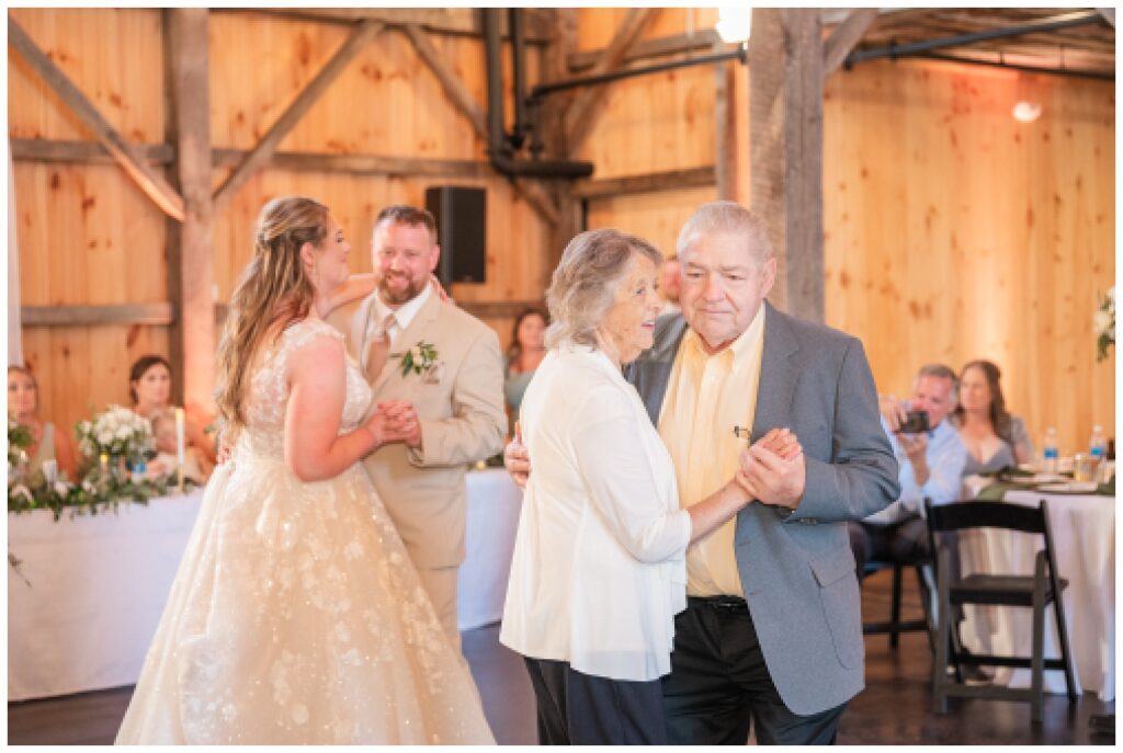 wedding guests dancing at the Village Barn venue in Monroeville, Ohio