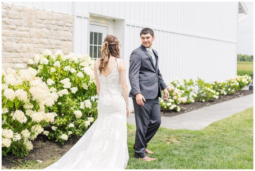 first look with bride and groom outside at Arlington Acres