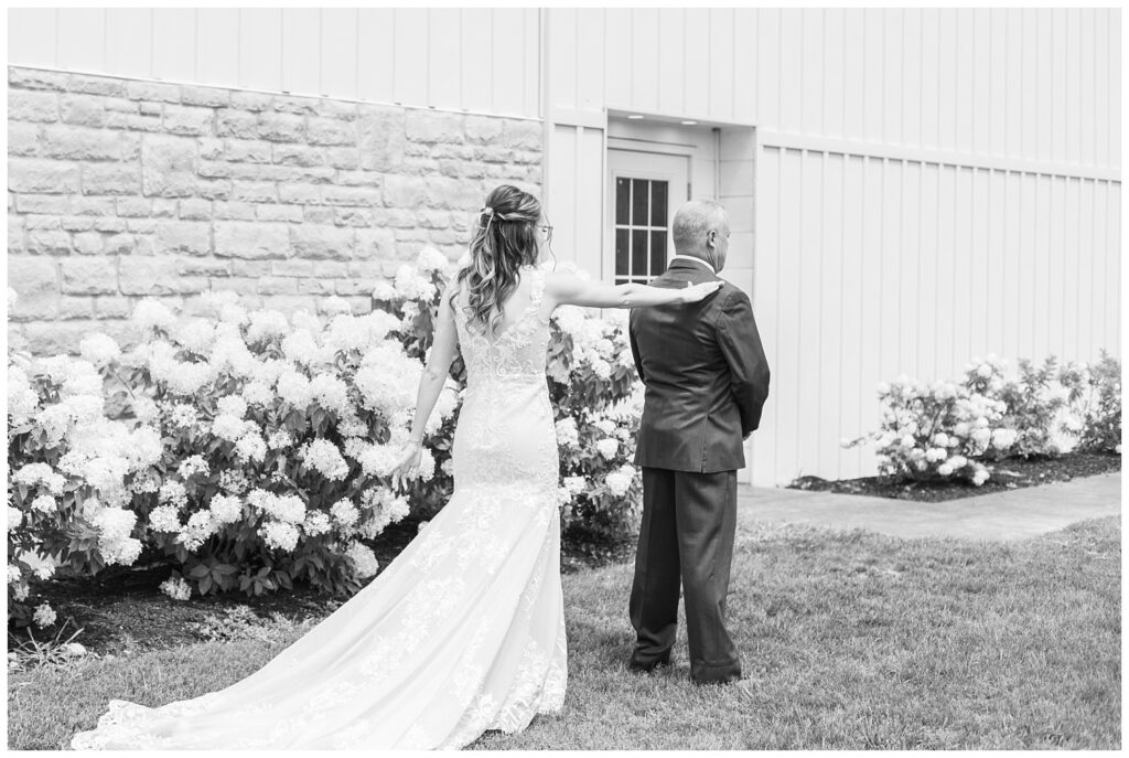 first look with bride and dad at summer wedding in Tiffin, Ohio