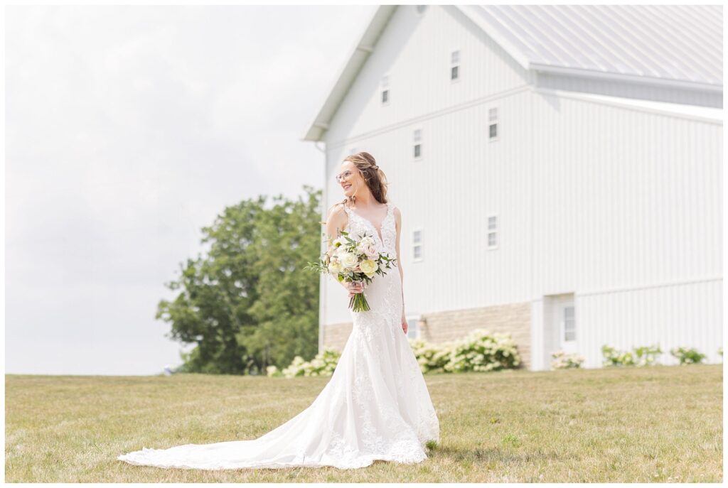 bride holding bouquet outside at Tiffin, Ohio wedding venue