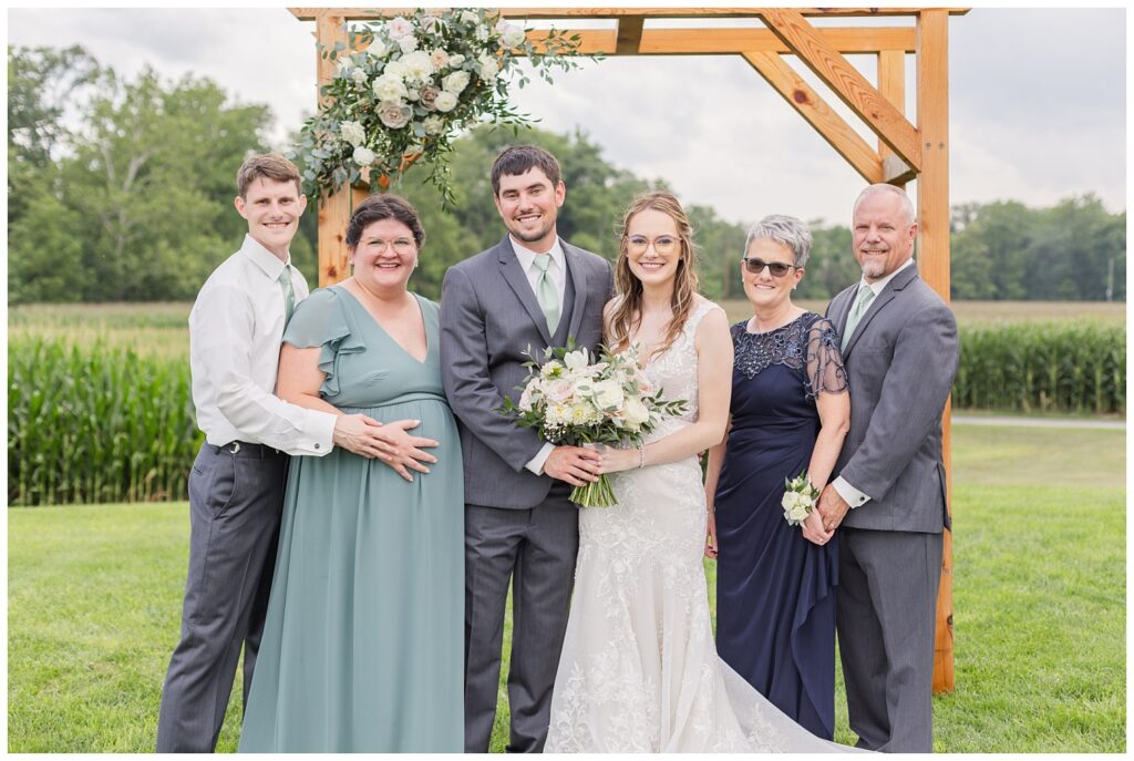 family formal portraits at ceremony site in Tiffin, Ohio