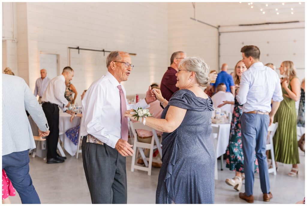 bride's grandparents dancing at summer reception in Tiffin, Ohio