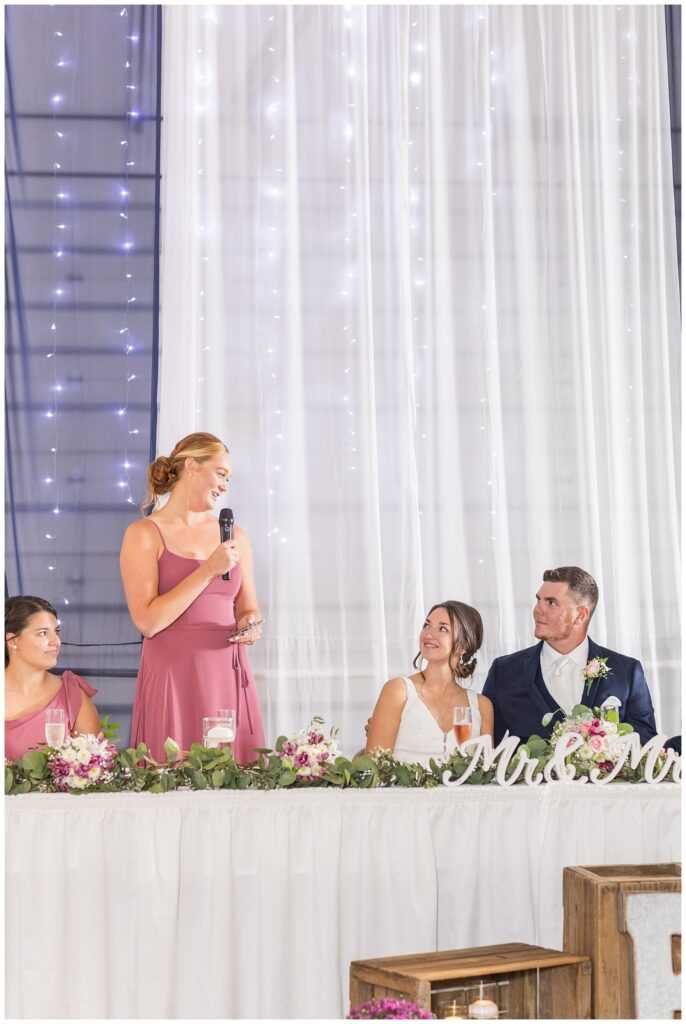 maid of honor giving her speech at Woods County Fairgrounds reception