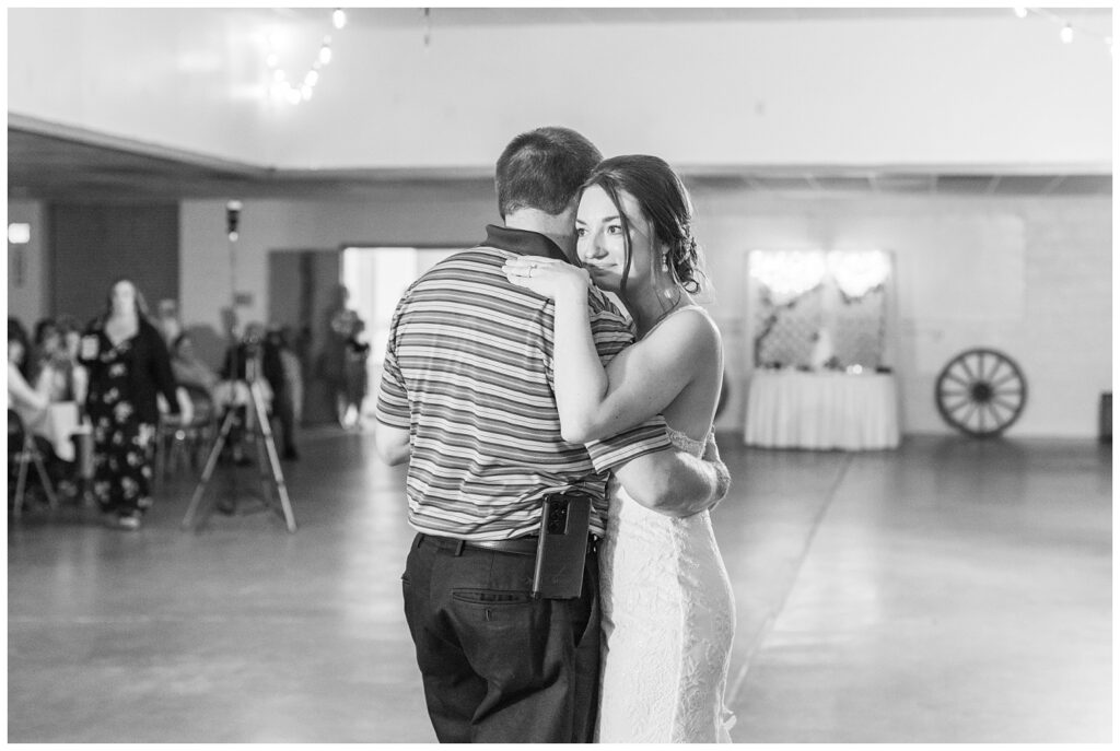 bride dancing with one of her uncles at fall wedding reception in northwest Ohio