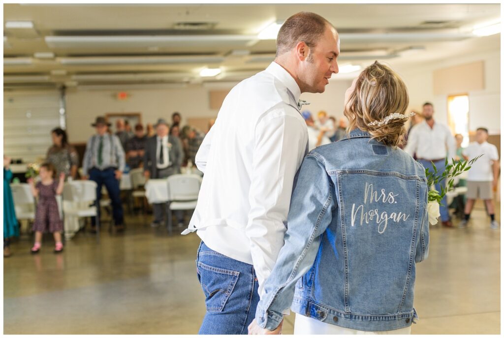 wedding couple make entrance into reception at Huron County Fairgrounds 