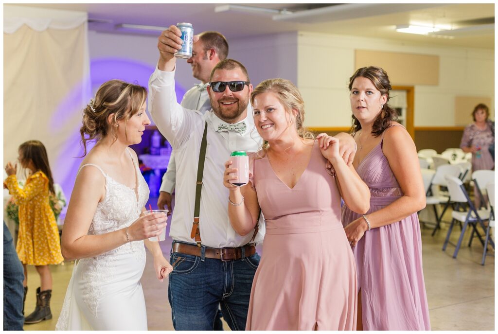 bridal party dancing with bride at wedding reception in northwest Ohio