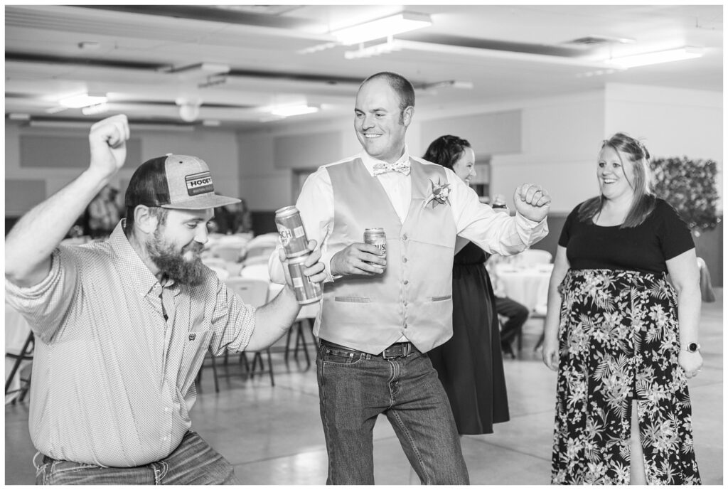 groom dancing with friends at wedding reception at Norwalk Ohio venue