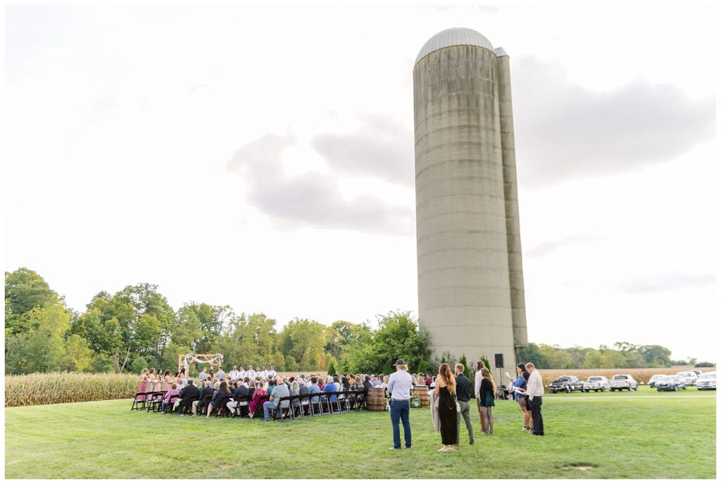 wide shot of outdoor ceremony next to a silo in Tiffin Ohio