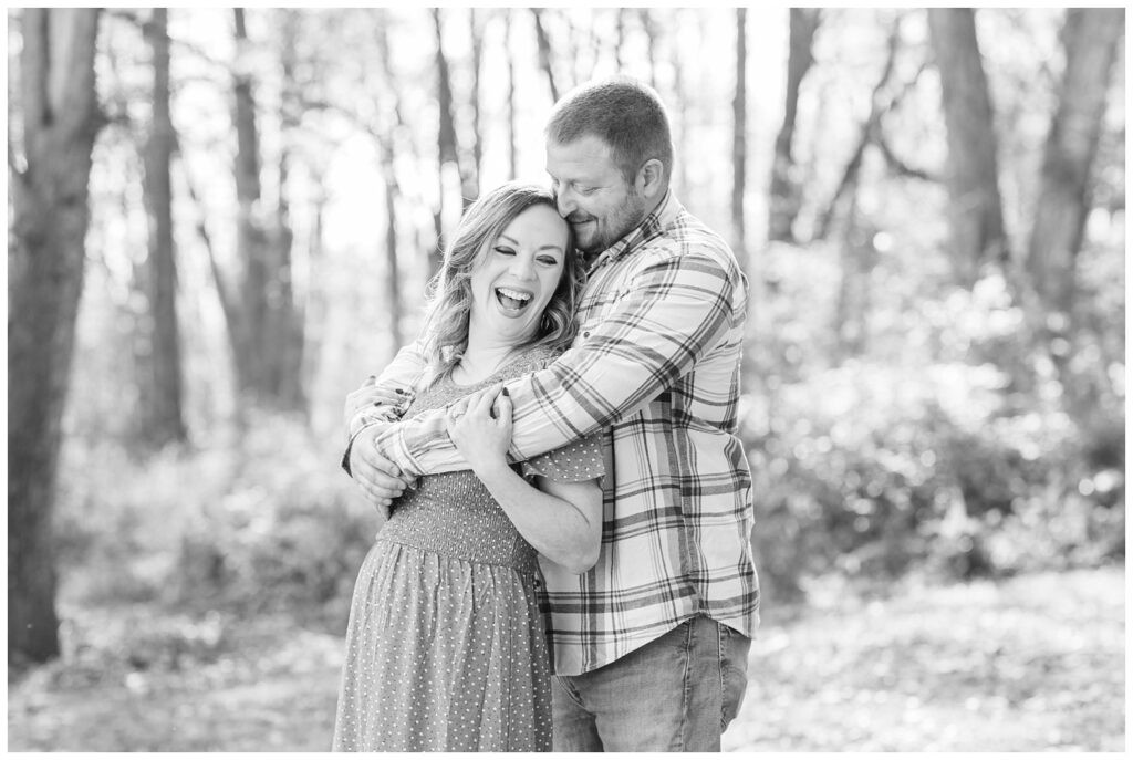 couple laughing together at Bradner Preserve engagement session in Ohio