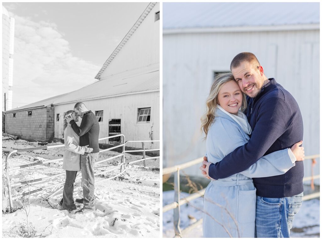 couple posing in the snow next to metal gates on their family's farm