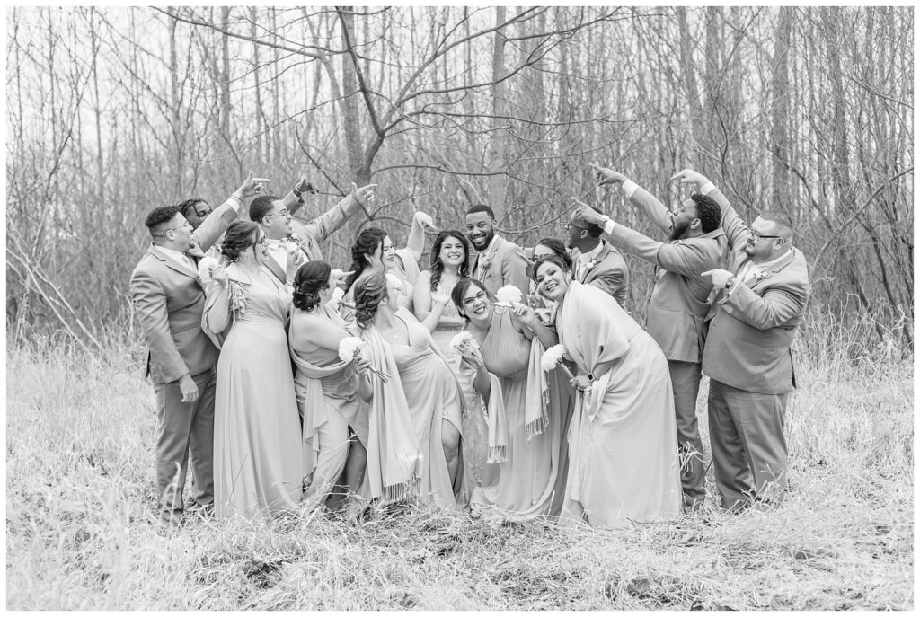 wedding party cheering for the bride and groom at Bradner Preserve