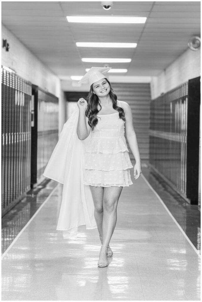 high school senior girl walking down the hall at her school in Sandusky