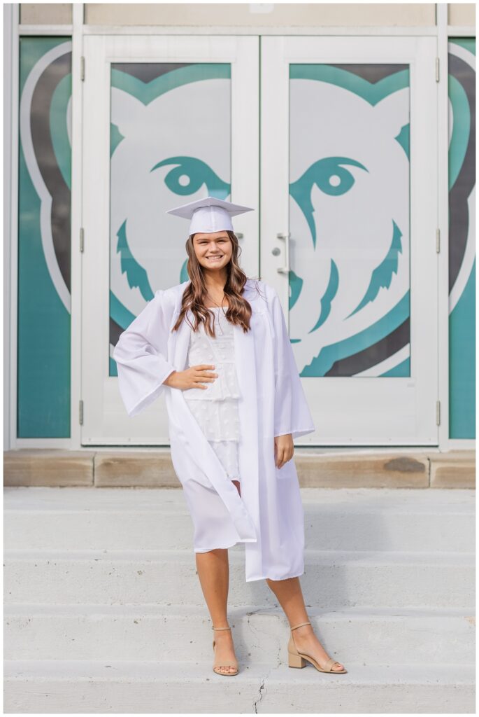 cap and gown senior session at Margaretta High School
