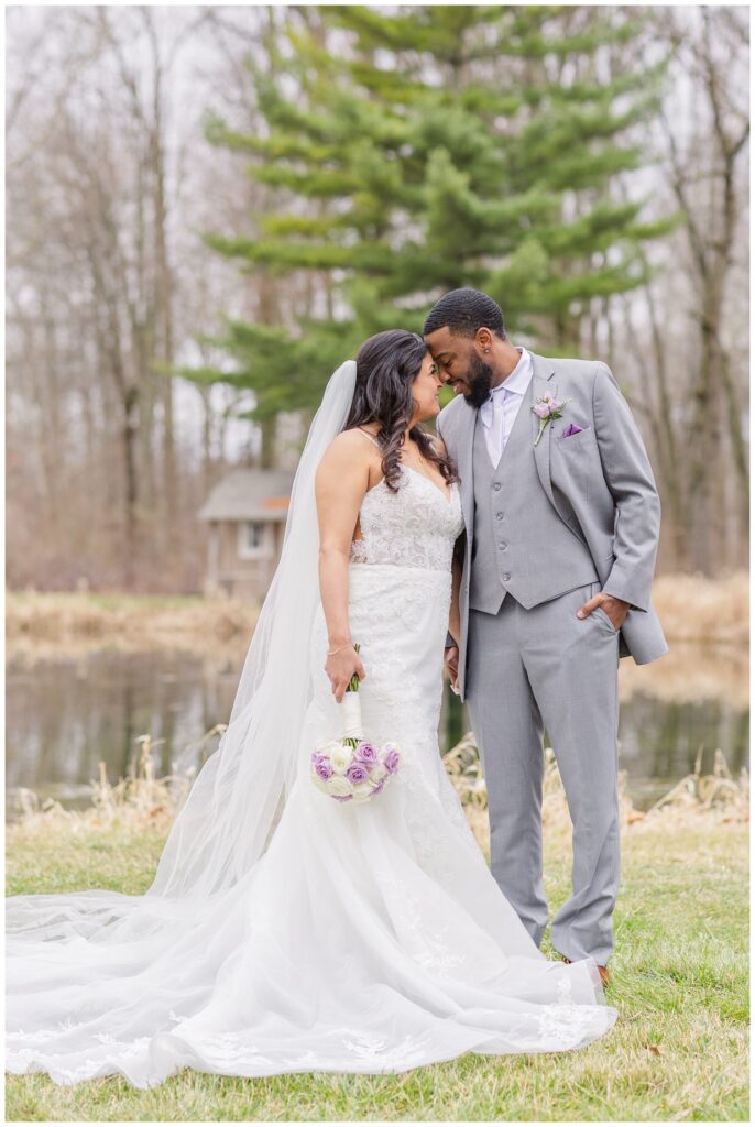 groom and bride touching foreheads at Bradner Preserve in Ohio