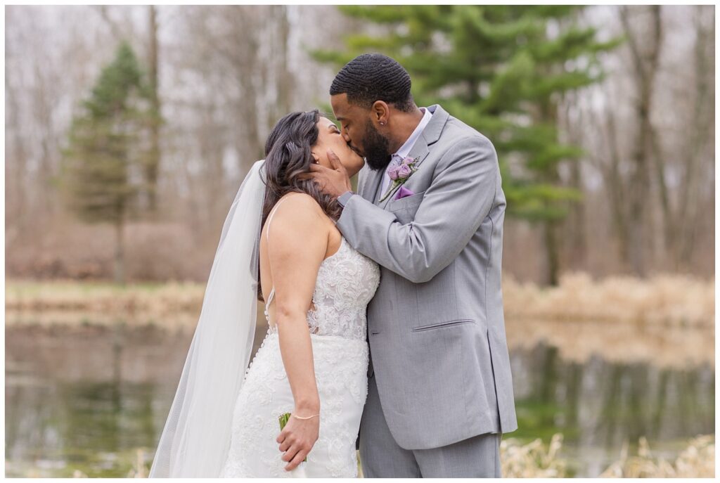 wedding couple share kiss at Bradner Preserve in northwest Ohio