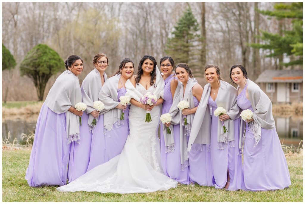 bride posing with bridesmaids at Bradner Reserve in March