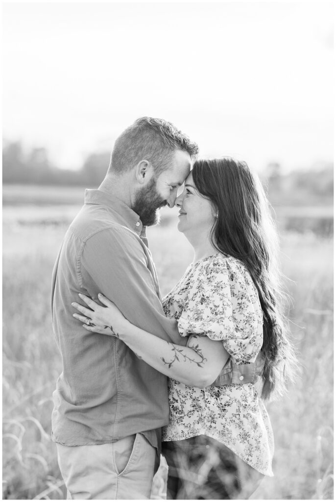 couple touching foreheads at Creek Bend Farm engagement session