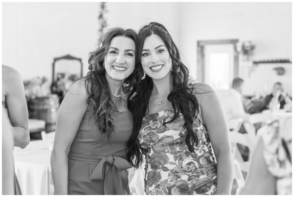 wedding guests posing for portraits at summer reception in West Mansfield, Ohio