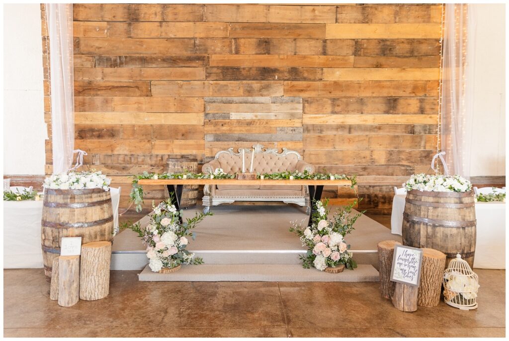 sweetheart table set up at wedding reception at Prairie Stone Farm venue