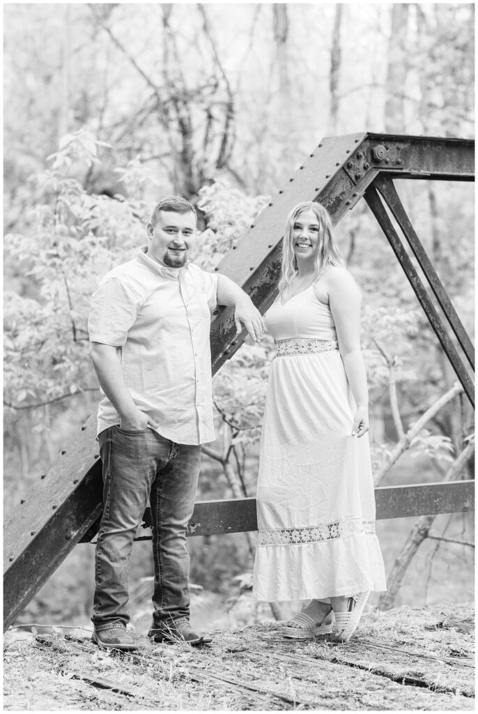 engagement session on an old bridge covered with moss in Willard, Ohio