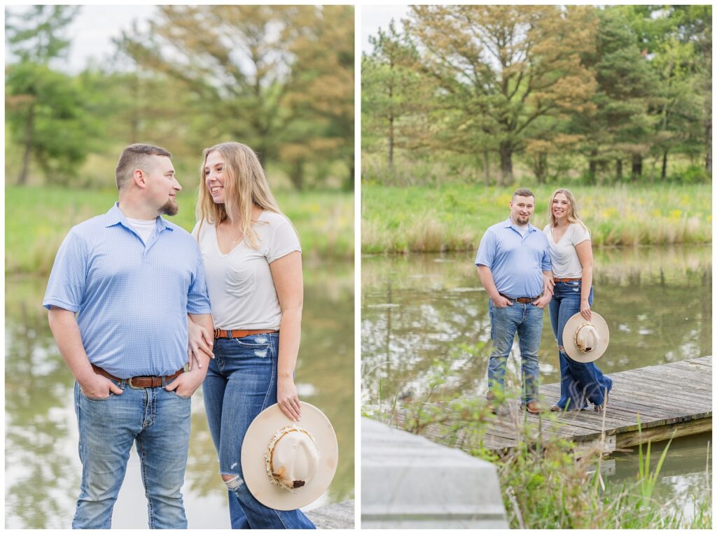 girl holding a hat and posing with her fiance on a dock in Sandusky, Ohio