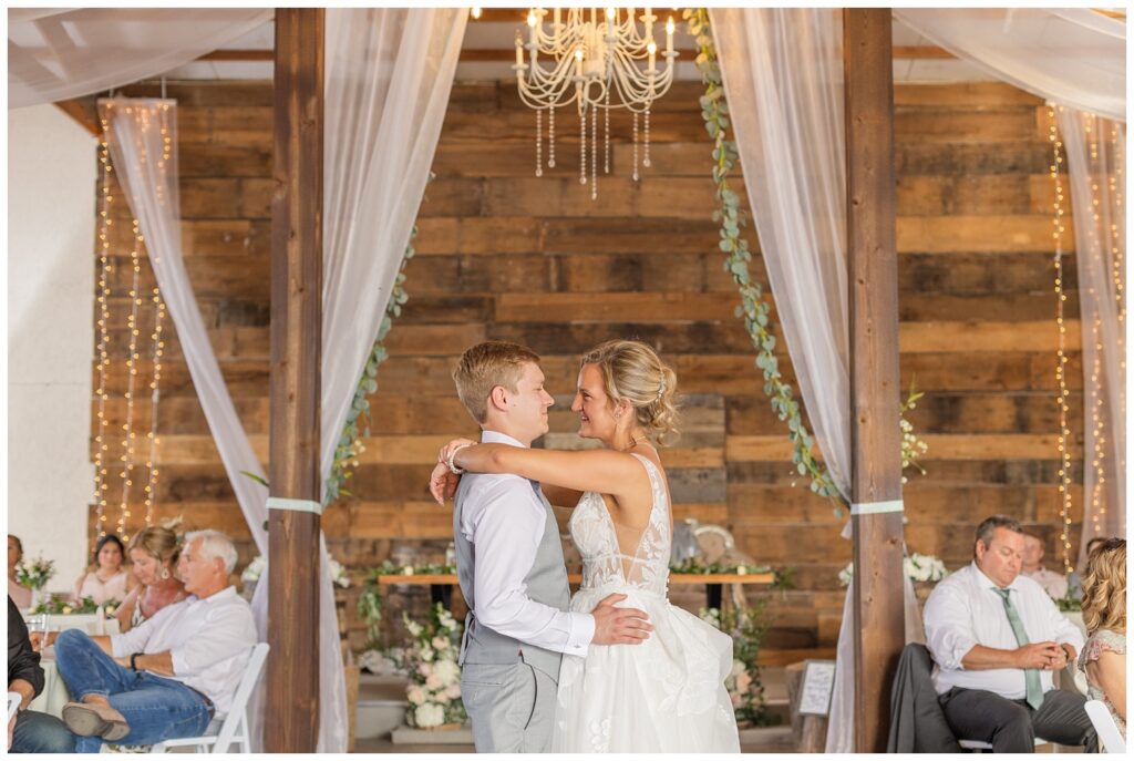 bride and groom share first dance during wedding reception in West Mansfield, Ohio