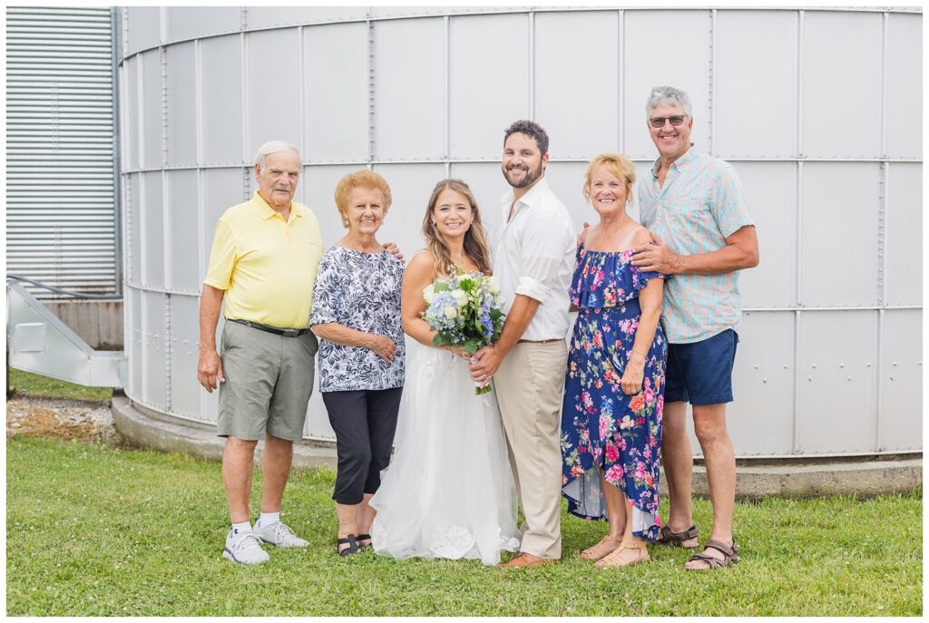 groom and bride posing with grandparents by Risingsun, Ohio photographer
