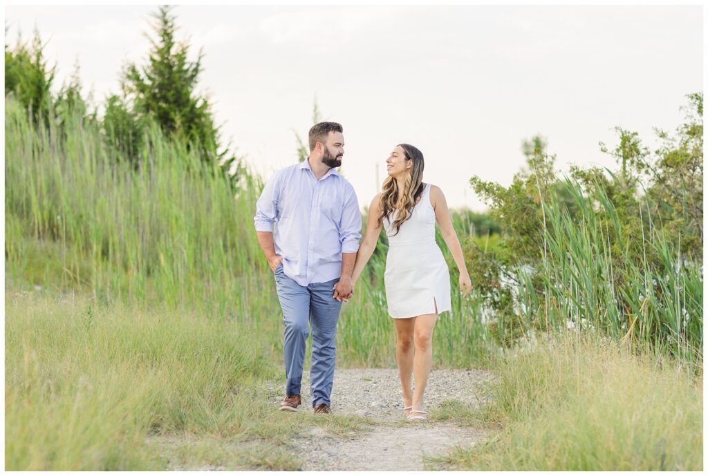 couple walking together on a rock path next to grass in Gibsonburg, Ohio