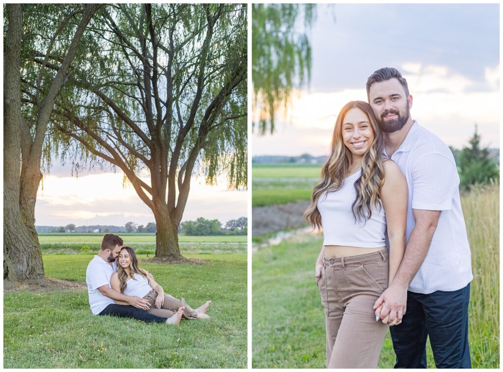 couple sitting together in the grass under some trees at Silver Rock Quarry