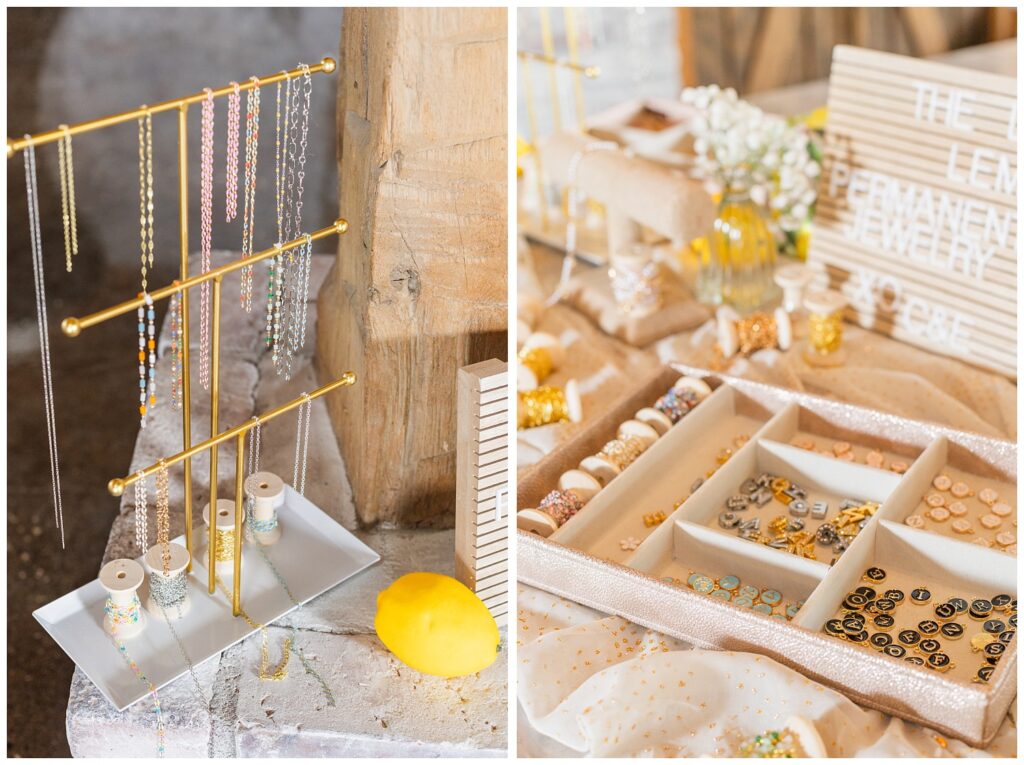 jewelry charms sitting in a rose gold box on a table at wedding venue in Tiffin, Ohio