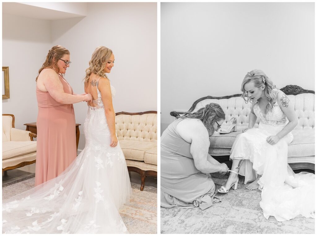 bride's maid of honor helping her put on her shoes and zip up her dress