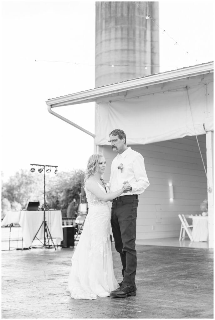 bride having first dance with her dad outside at wedding venue in Tiffin, Ohio