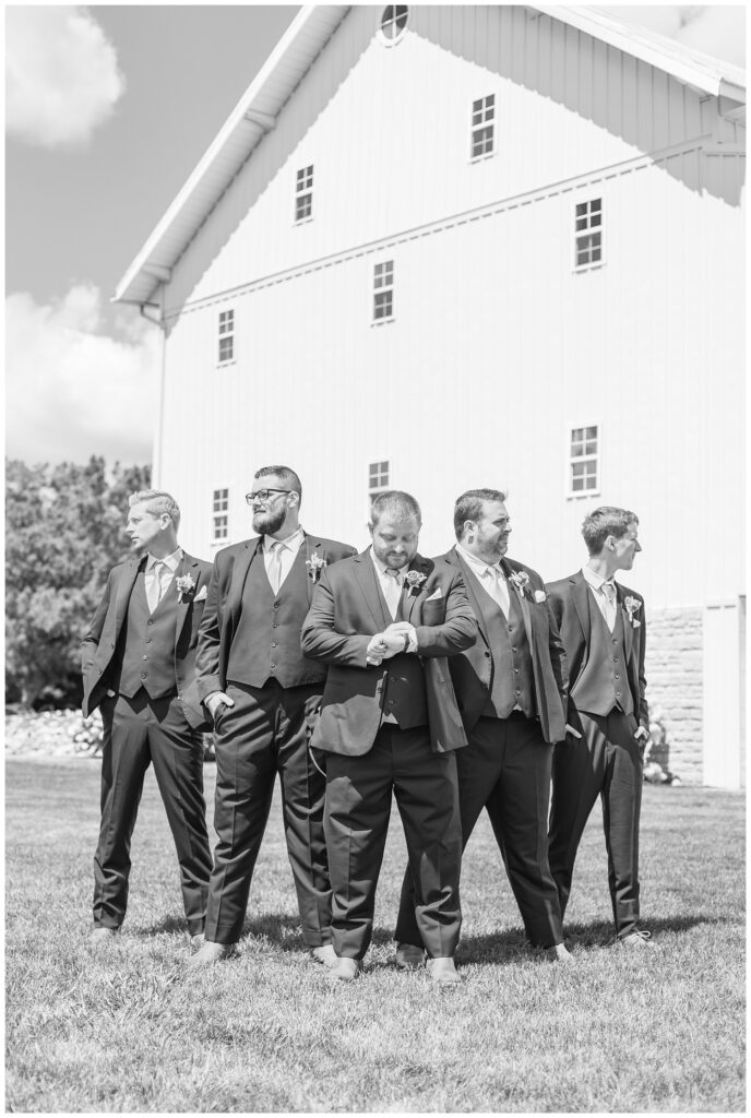 groomsmen standing outside together at Tiffin, Ohio wedding venue