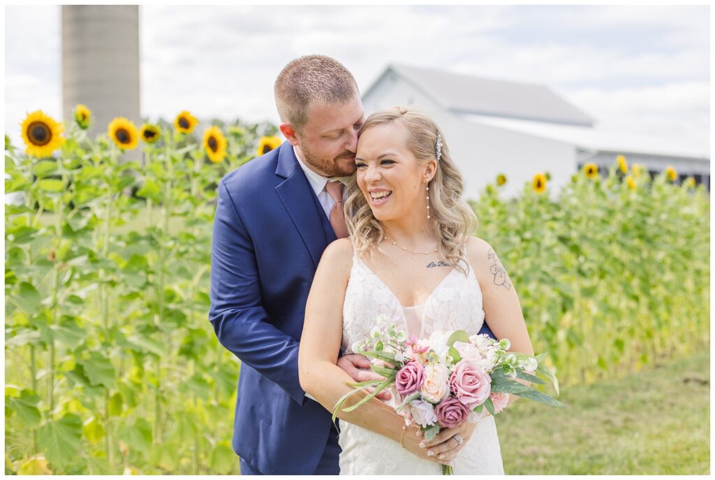 bride and groom laughing together outside at Arlington Acres wedding venue