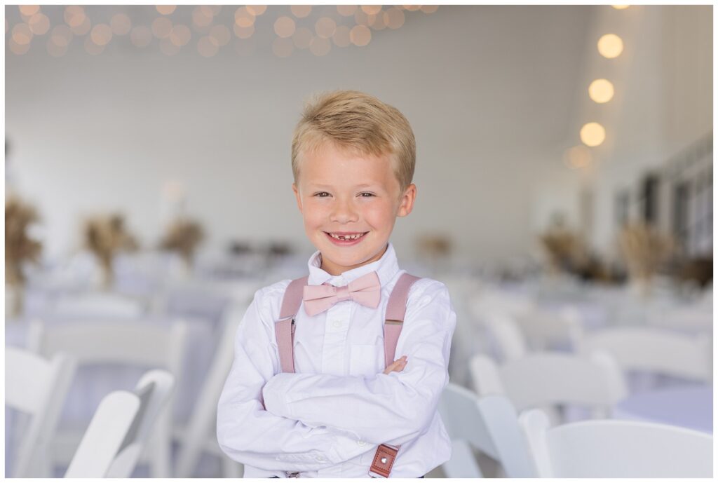 bride's son posing together inside Arlington Acres wedding venue