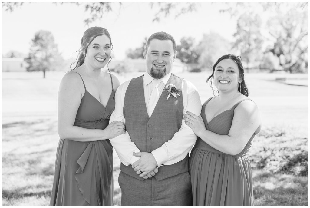 family formal portraits outside after the church ceremony in Norwalk, Ohio