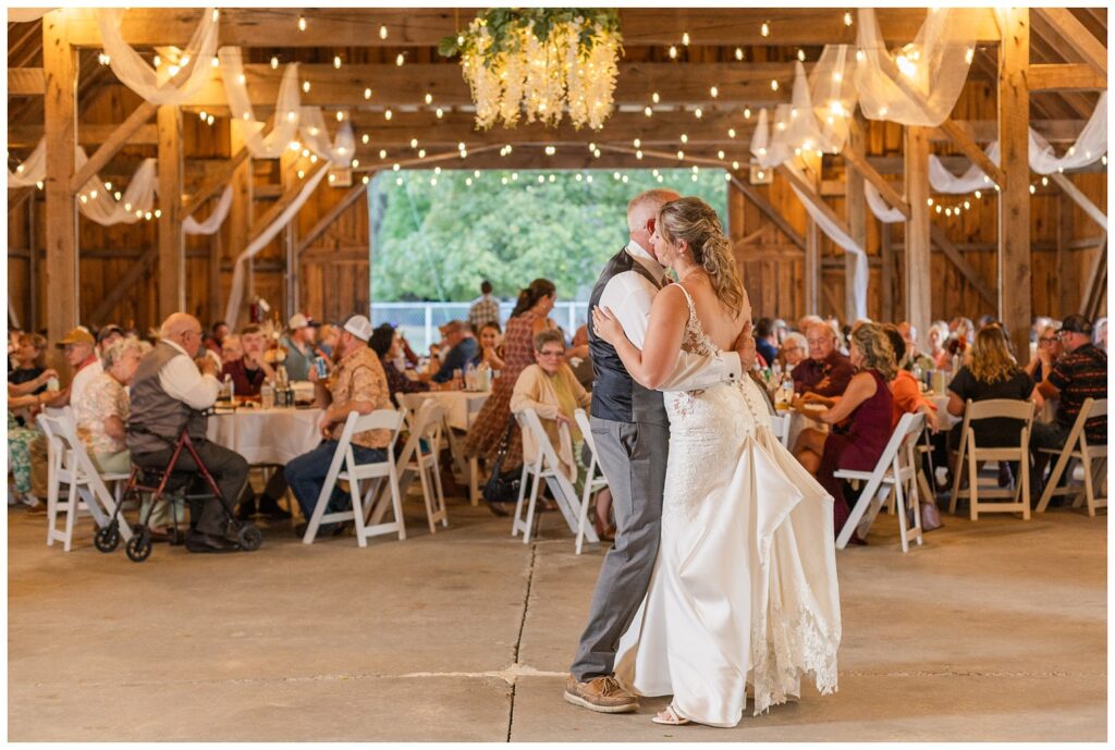 bride dancing with her dad inside the Heritage Barn in Norwalk, Ohio