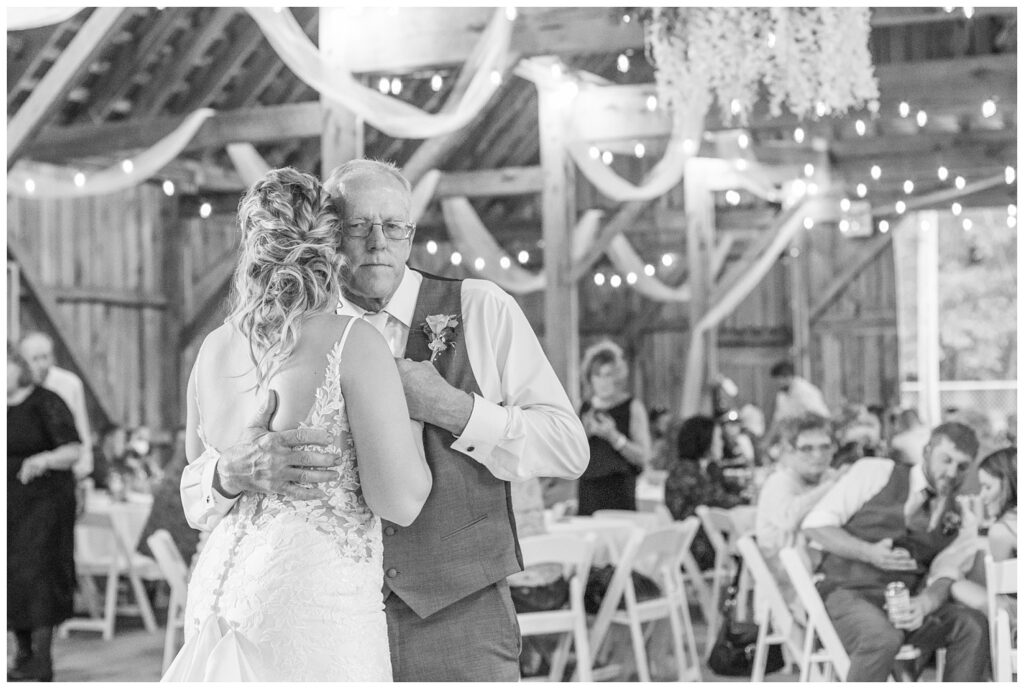 bride dancing with her dad inside the Heritage Barn at Norwalk, Ohio wedding reception