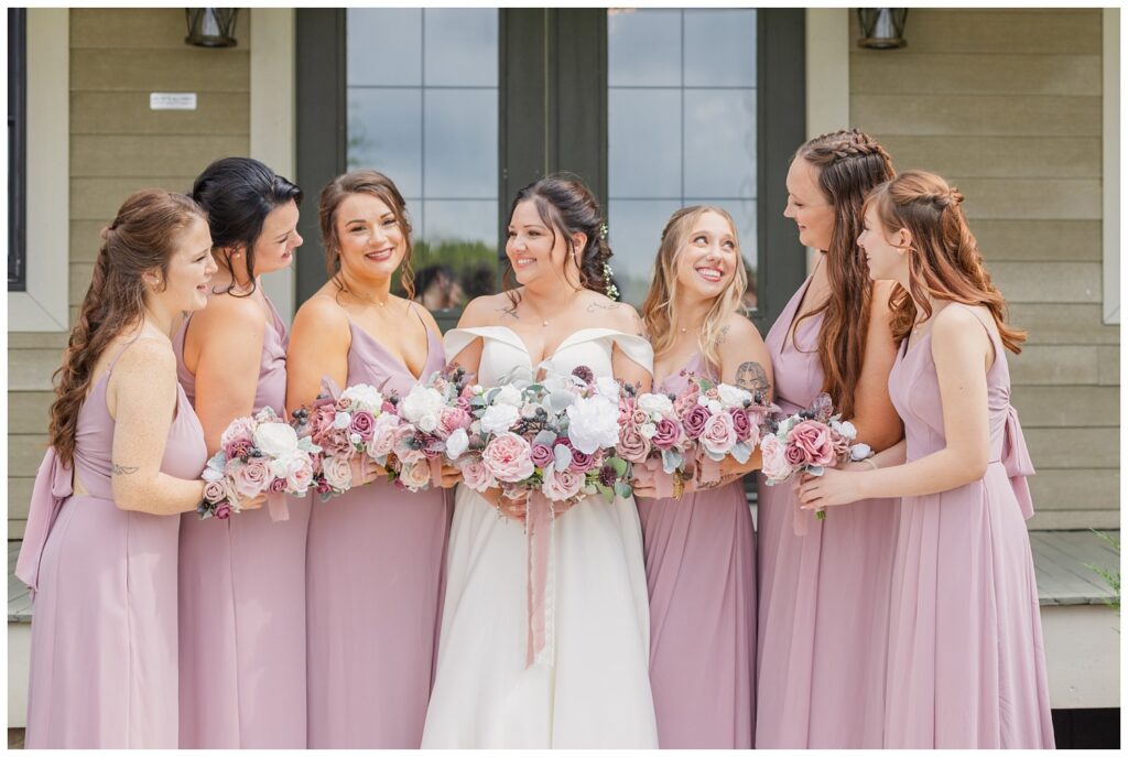 bridal party laughing and smiling at Findlay, Ohio wedding venue