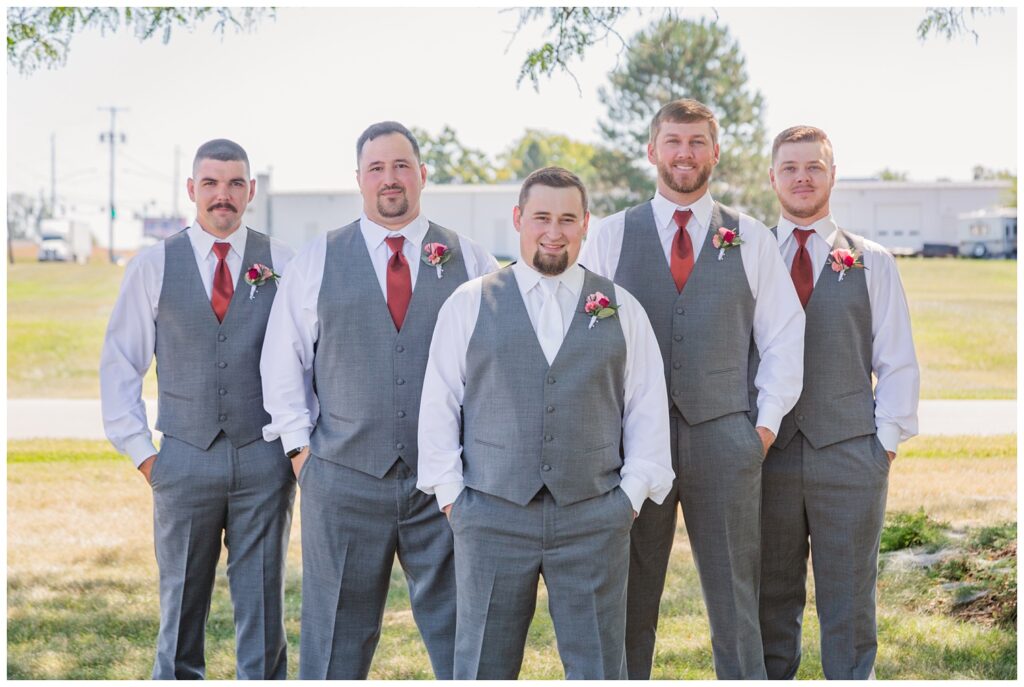 groom posing with the groomsmen at a Norwalk, Ohio wedding