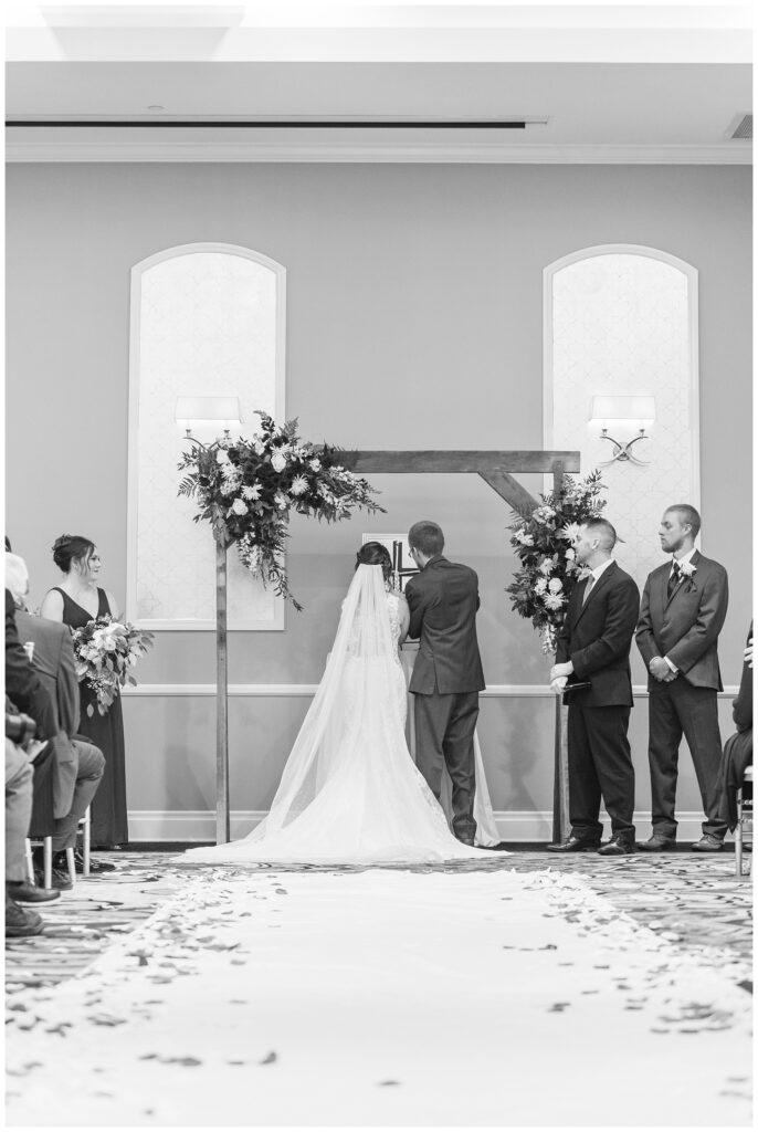 wedding couple doing a unity cord ceremony at the hotel 