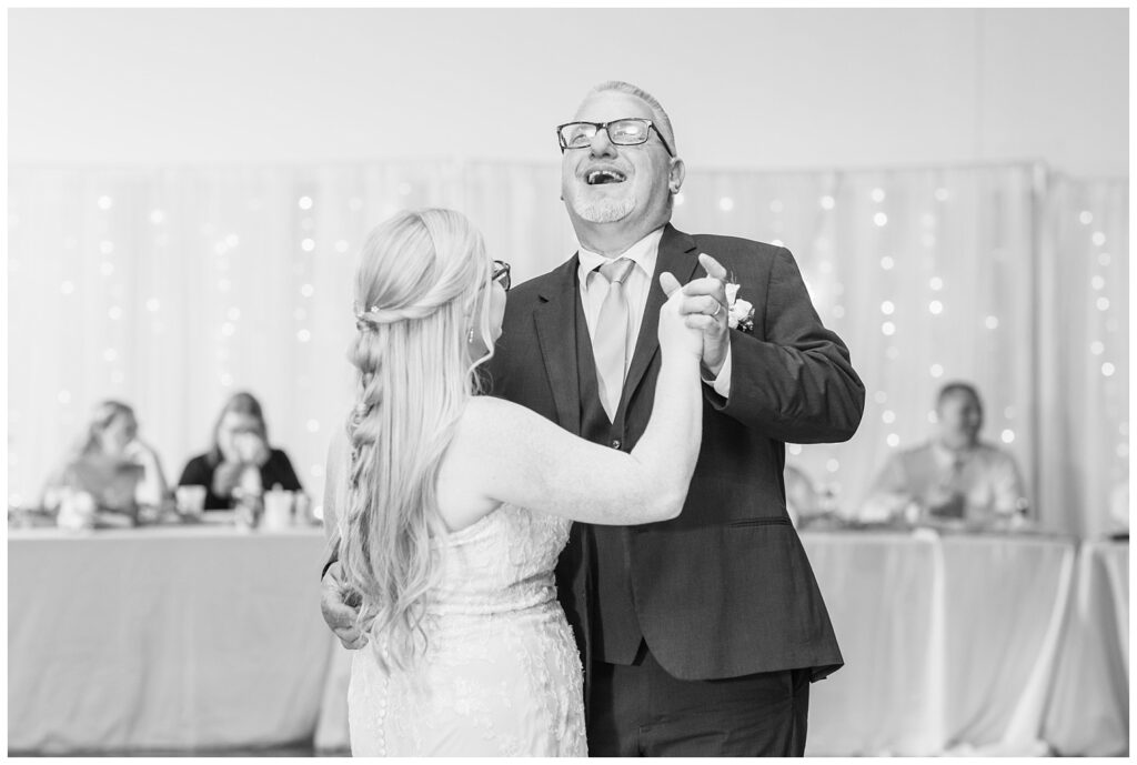 bride and her dad having a dance during the reception at Stacy's Place