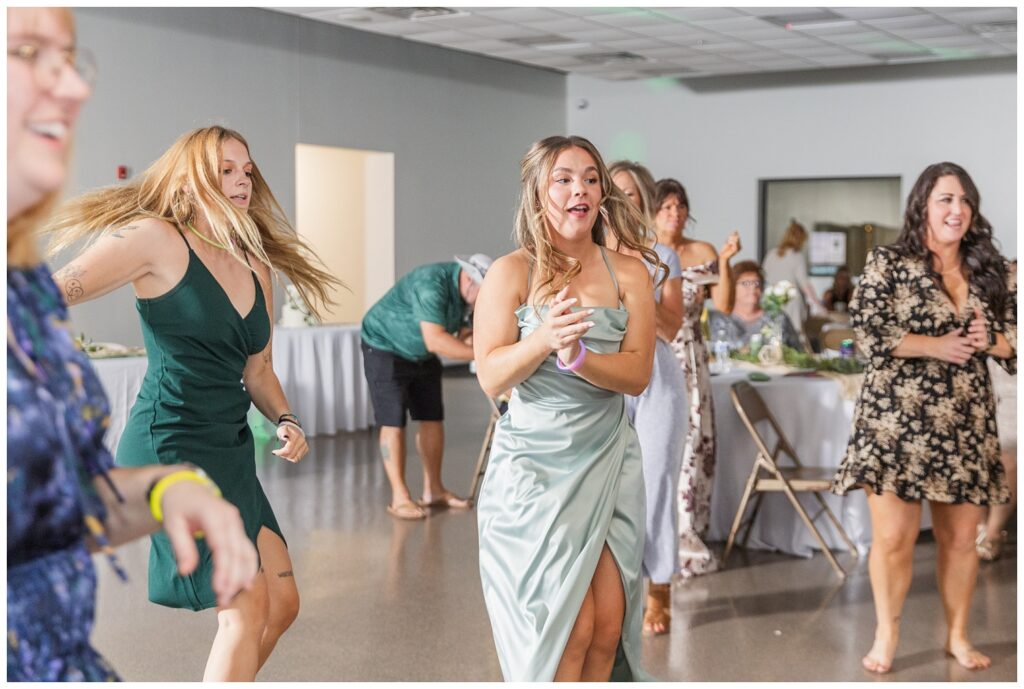 guests dancing at fall wedding reception at Stacy's Place in Fostoria, Ohio