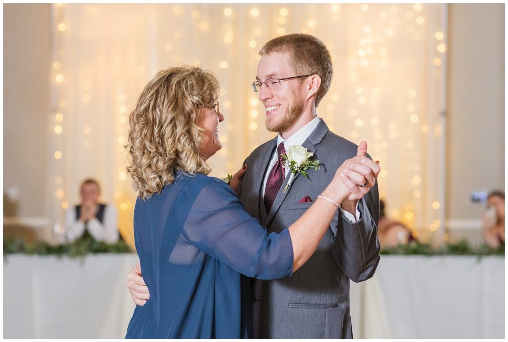 groom dancing with his mom at fall wedding reception at The Hancock Hotel