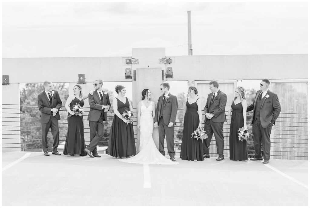 wedding party posing on the top of the parking garage in Findlay, Ohio