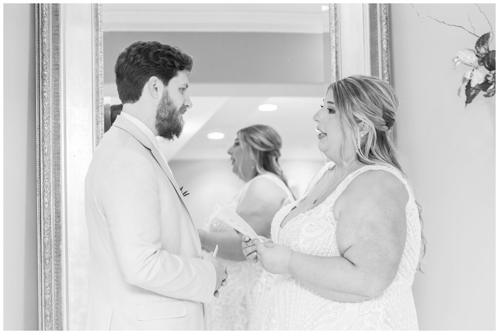 bride reading aloud her vows to each other before the ceremony at Old Calvary Church