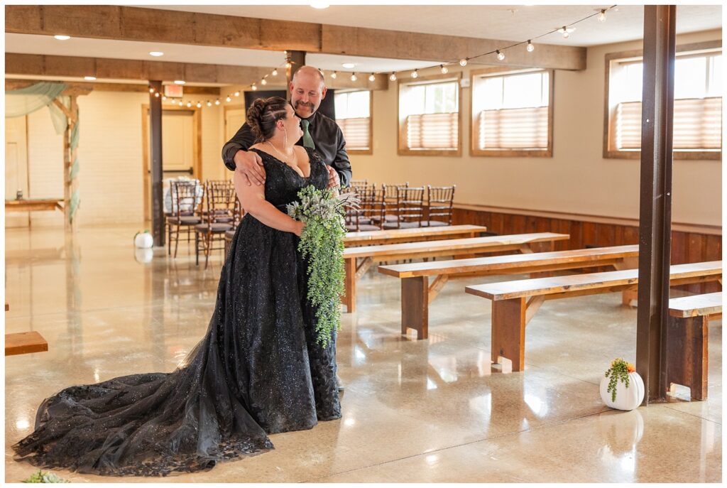 bride and groom posing together inside the chapel at Pickwick Place in Bucyrus, Ohio