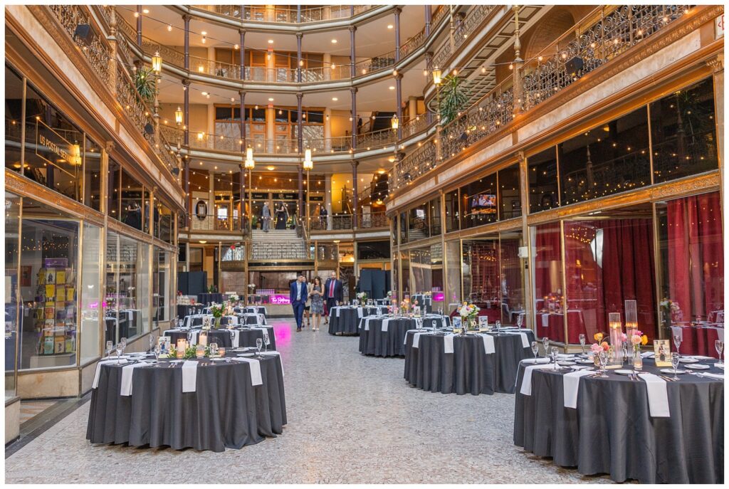 bottom floor of the Arcade Cleveland decorated with reception tables for wedding