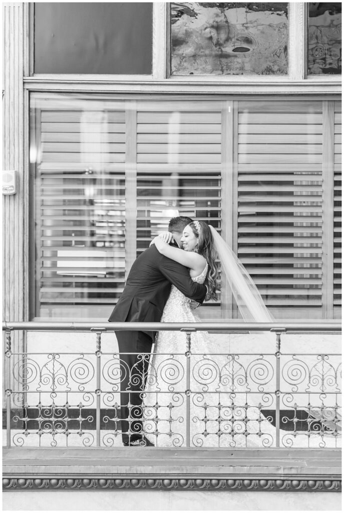 bride hugging the groom during their first look at Cleveland wedding