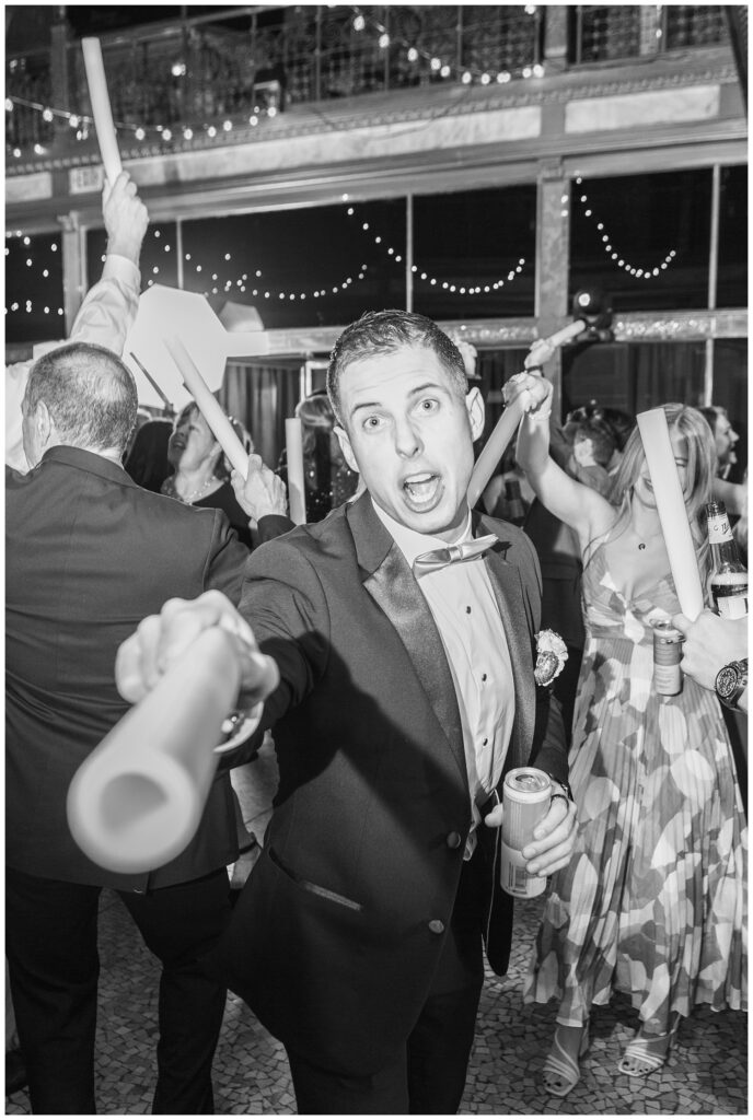 groomsmen having fun dancing at wedding reception in Cleveland, Ohio